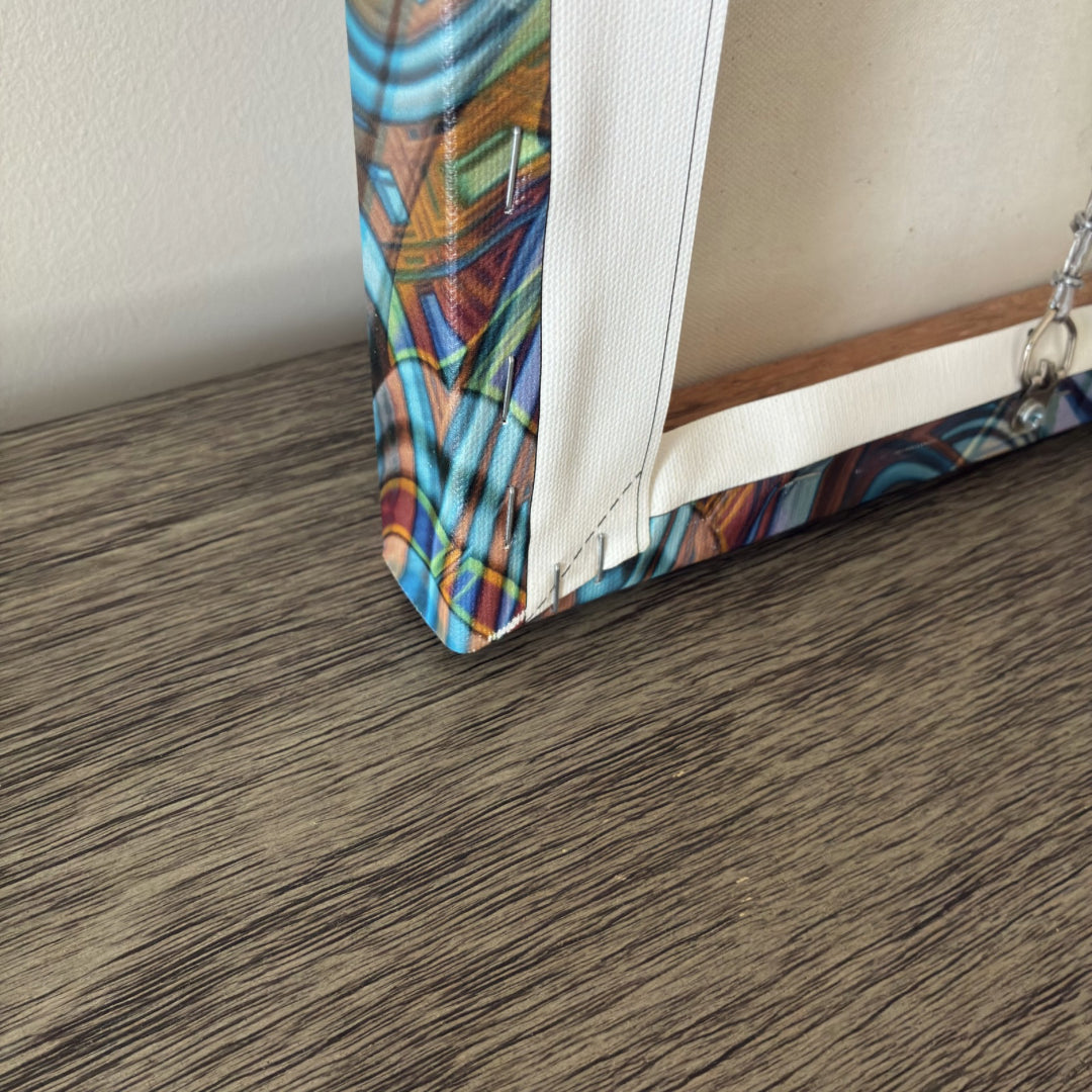Close-up of gallery-wrapped edges on a Patrick Zion canvas print with seamless artwork extending around the sides.